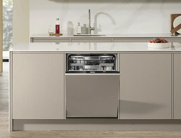 Affordable Appliance technician repairing a home dishwasher
