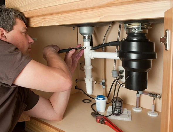 Garbage disposal repair technician in Meridian Idaho